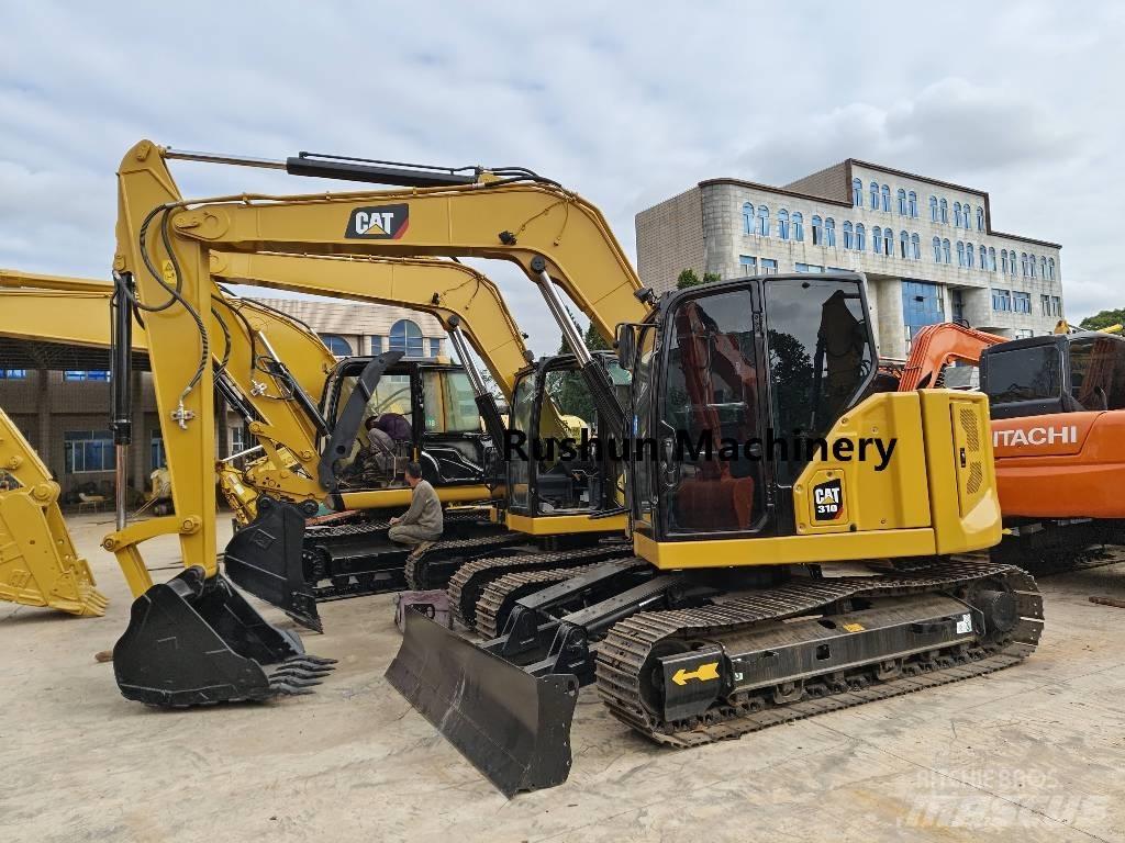 CAT 310 Koparki gąsienicowe
