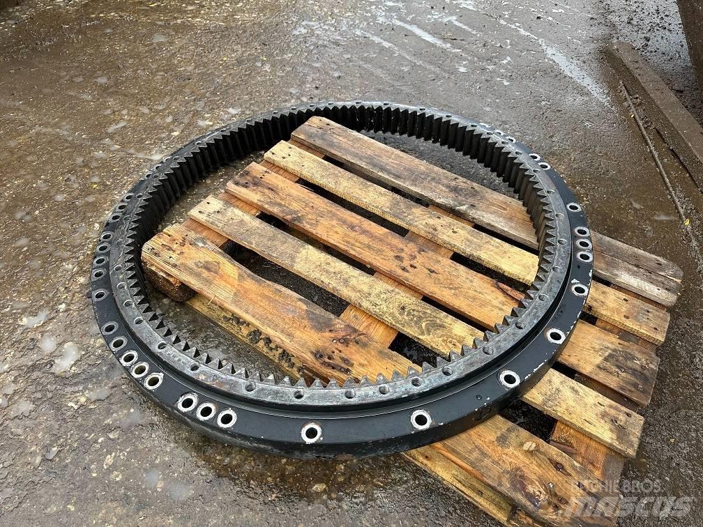 CAT 323 slew ring Mosty, wały i osie