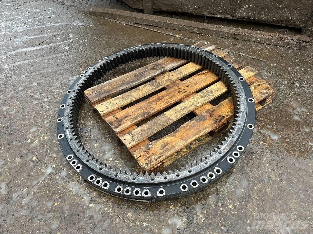 CAT 323 slew ring Mosty, wały i osie