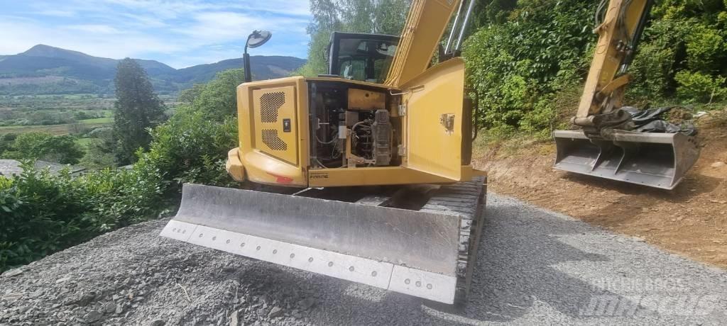 CAT 310 Koparki gąsienicowe