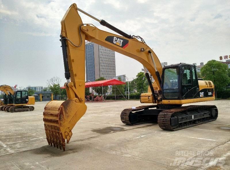 CAT 323 Koparki gąsienicowe