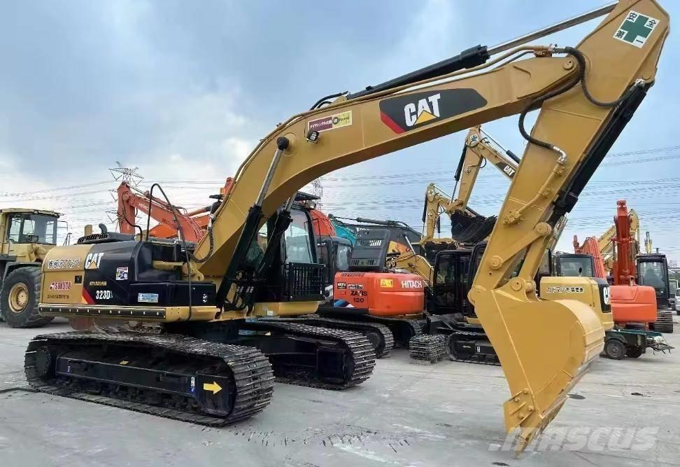CAT 323 D Koparki gąsienicowe