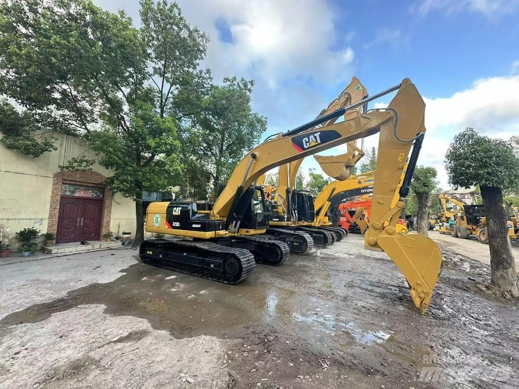 CAT 323 D Koparki gąsienicowe