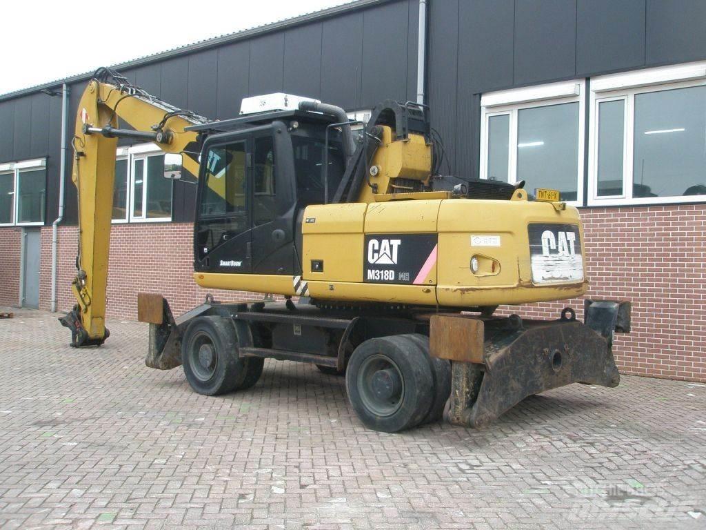 CAT M318D Koparki kołowe