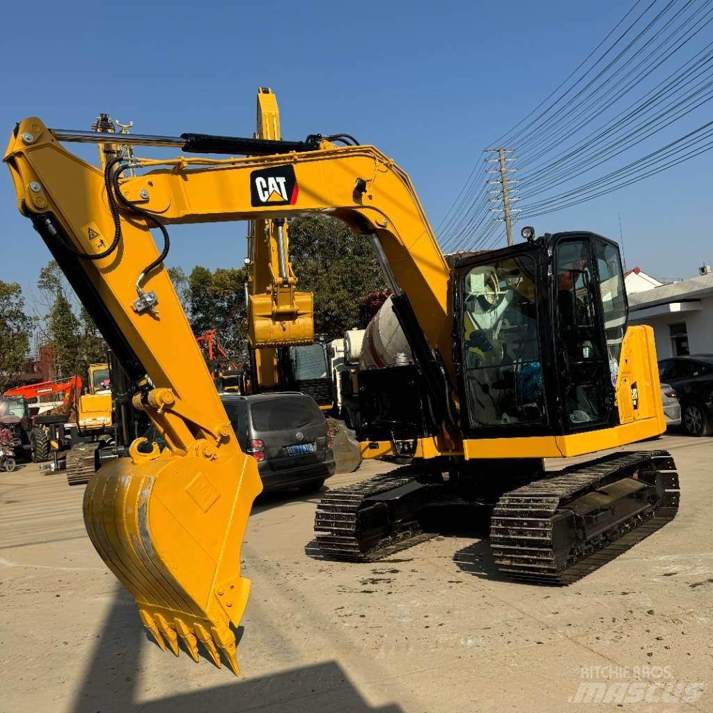 CAT 310 Koparki gąsienicowe
