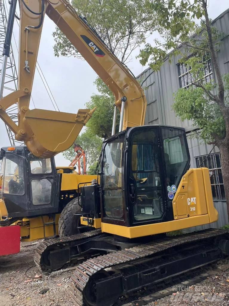 CAT 310 Koparki gąsienicowe