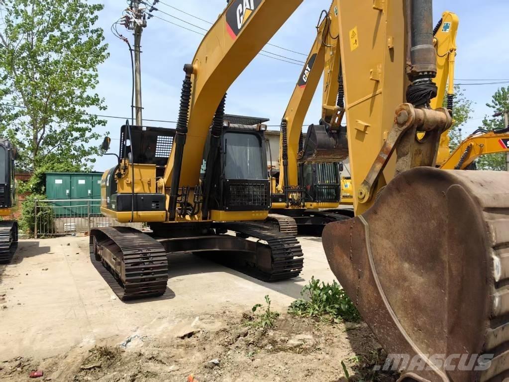 CAT 323 D Koparki gąsienicowe