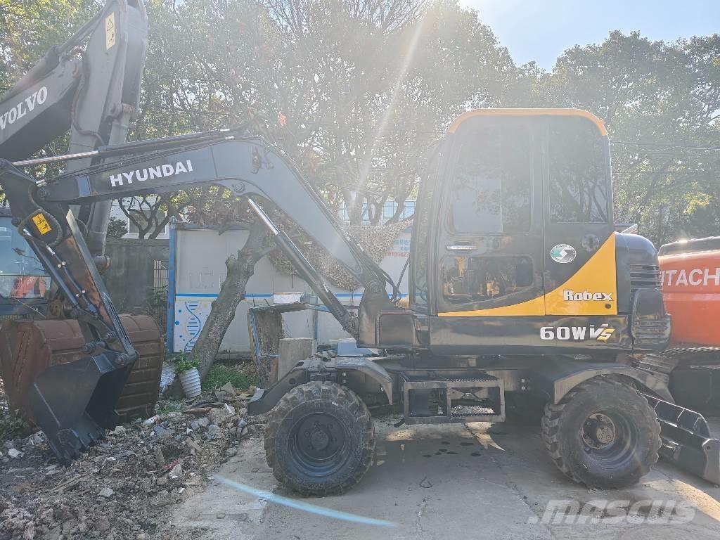 Hyundai 60 W VS Minikoparki