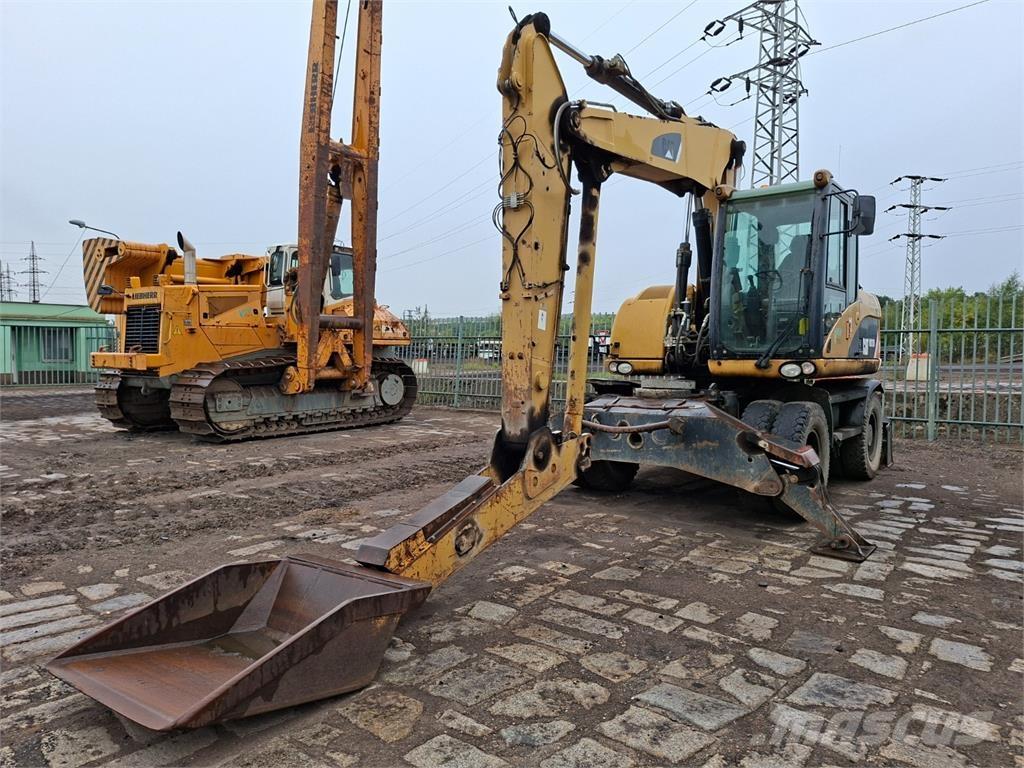 CAT M313D 4X4 Maszyny budowlane - Inne