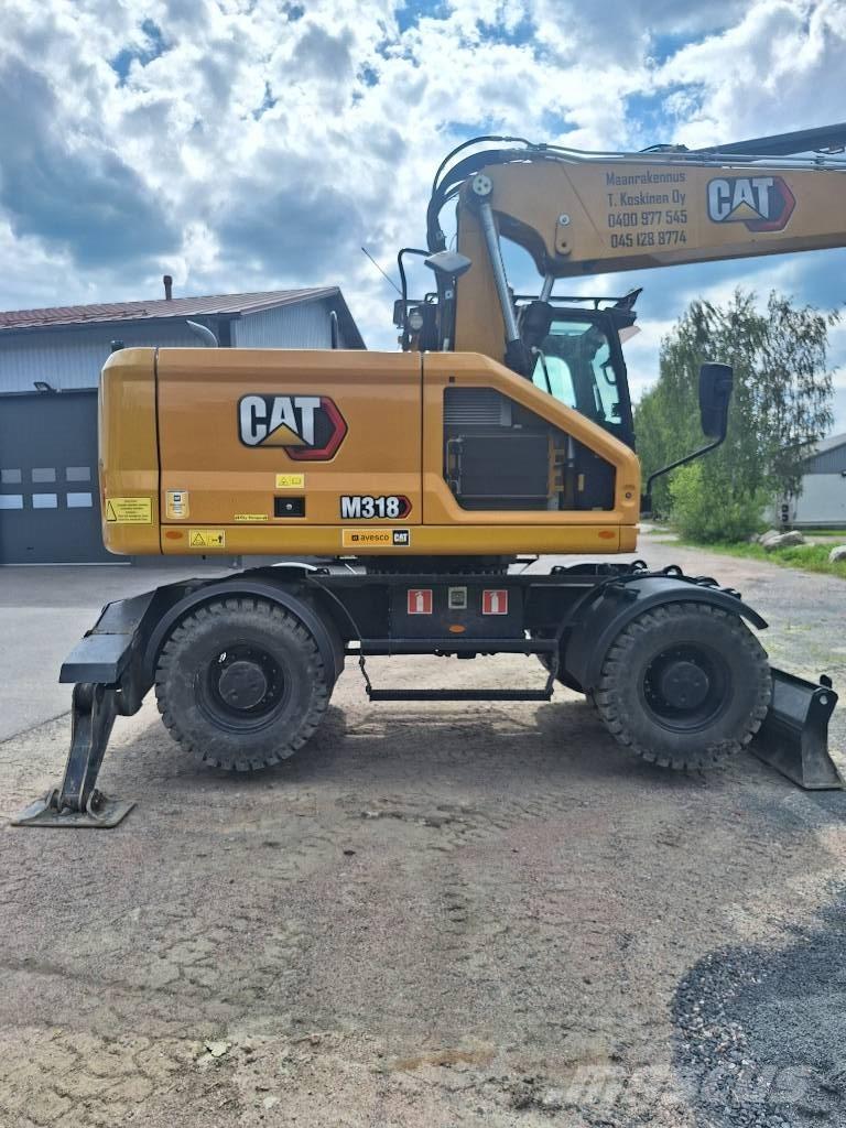 CAT M 318 Koparki kołowe