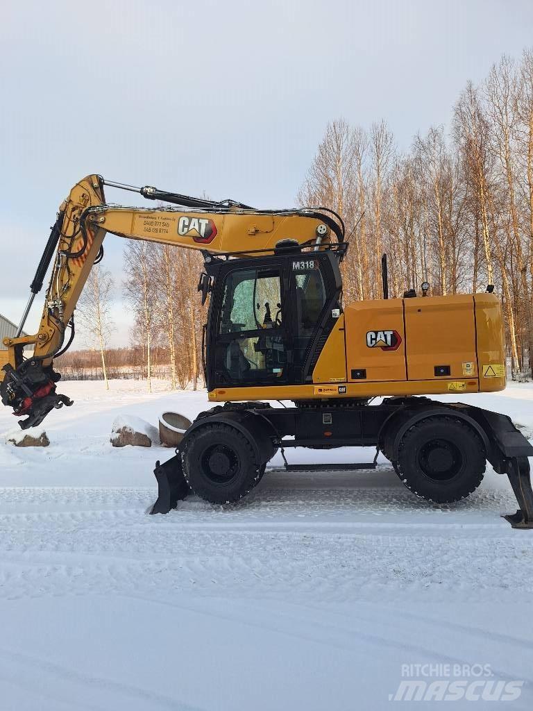 CAT M 318 Koparki kołowe
