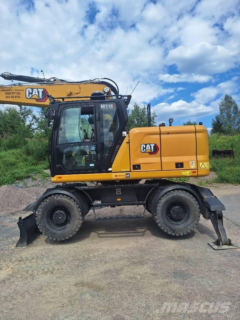 CAT M 318 Koparki kołowe
