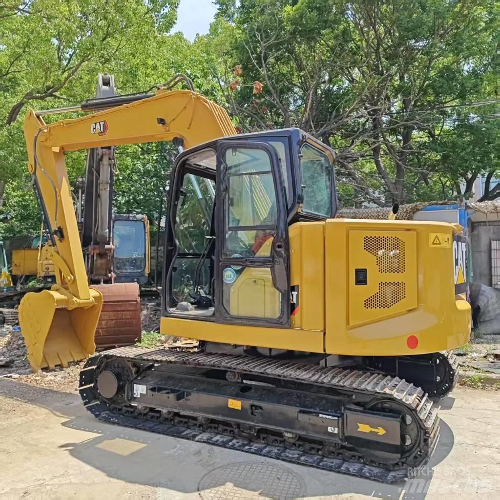 CAT 310 Koparki gąsienicowe