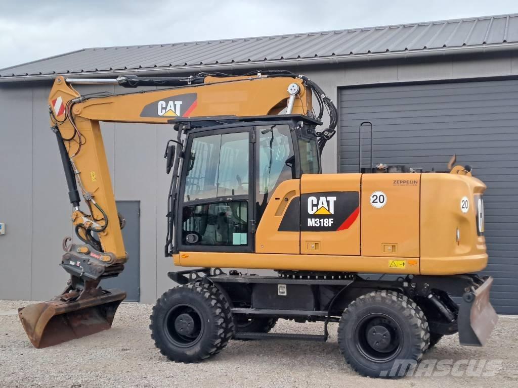 CAT M318F Koparki kołowe