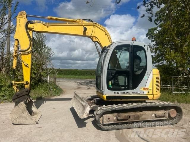 New Holland E 70 SR Midikoparki  7t - 12t