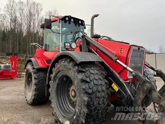Huddig 1260 Koparko-ładowarki
