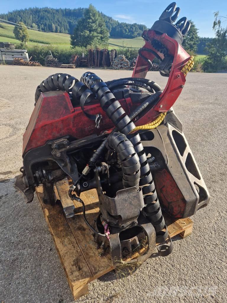 Komatsu 124 Maszyny do okrzesywania gałęzi