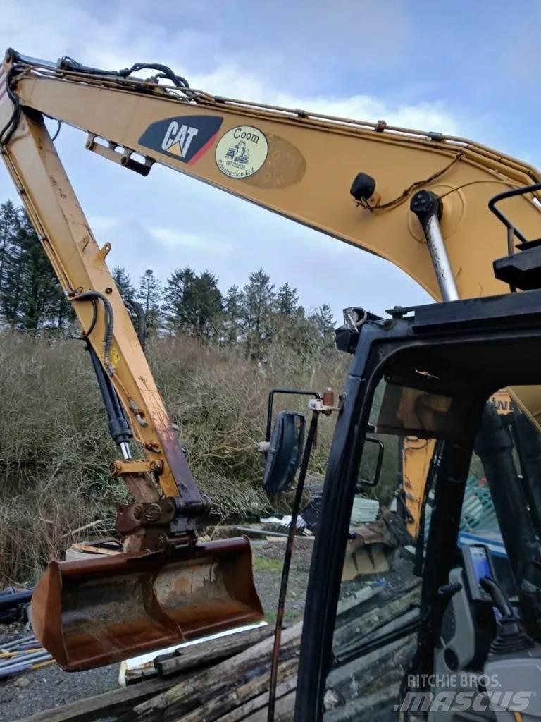CAT 320 E Koparki z długim ramieniem