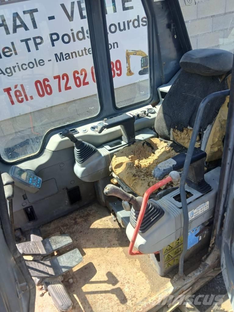 Komatsu PC 210 Kabiny i wnętrze