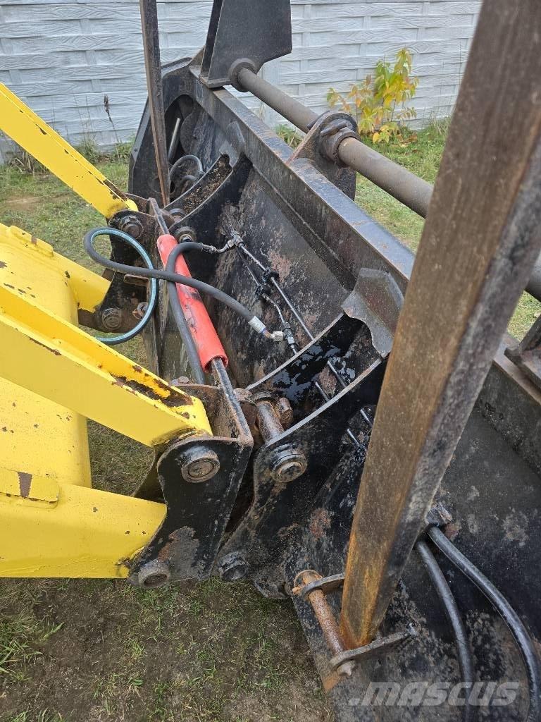 New Holland 115 Koparko-ładowarki