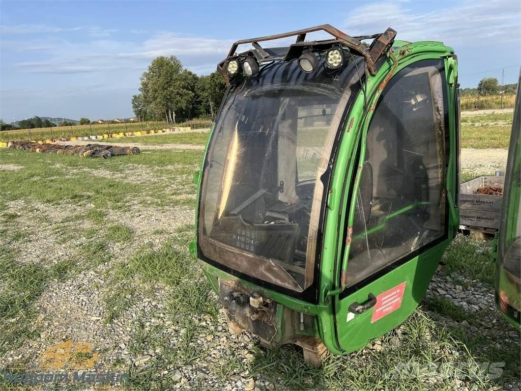 John Deere 1010E Kabiny i wnętrze