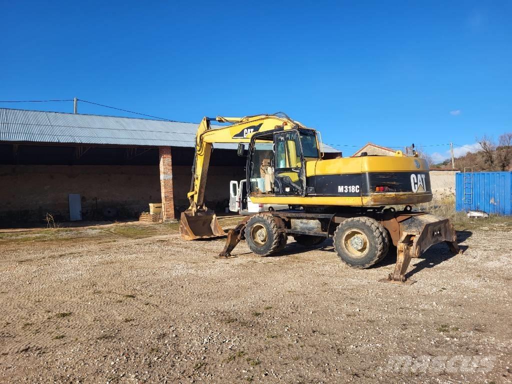 CAT M318c Koparki kołowe