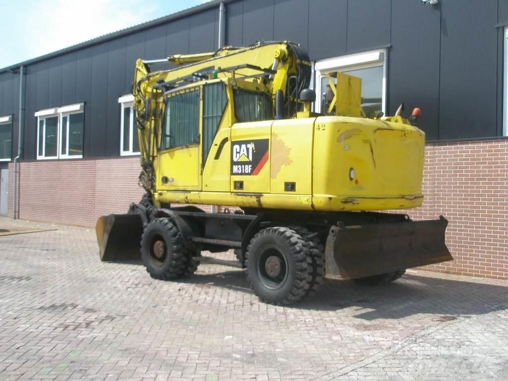 CAT M318F Koparki kołowe