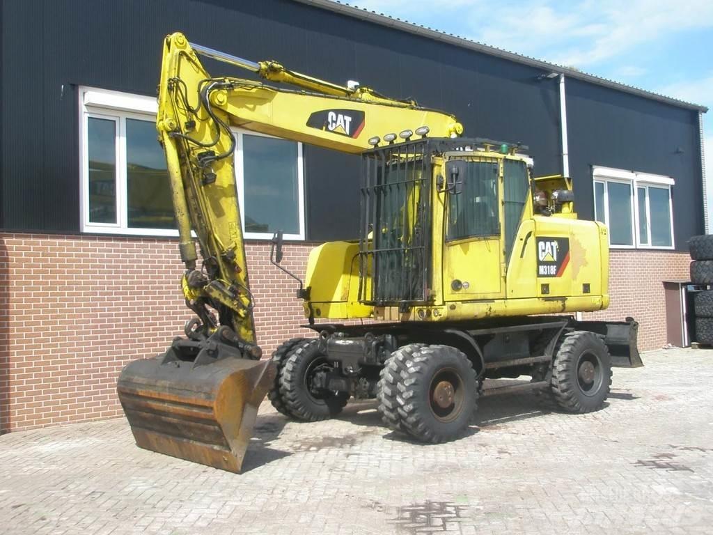 CAT M318F Koparki kołowe