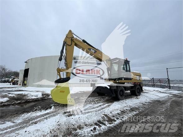 CAT M318D Koparki kołowe