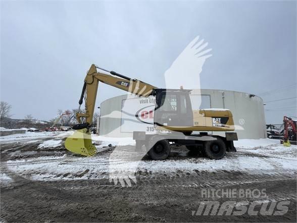 CAT M318D Koparki kołowe