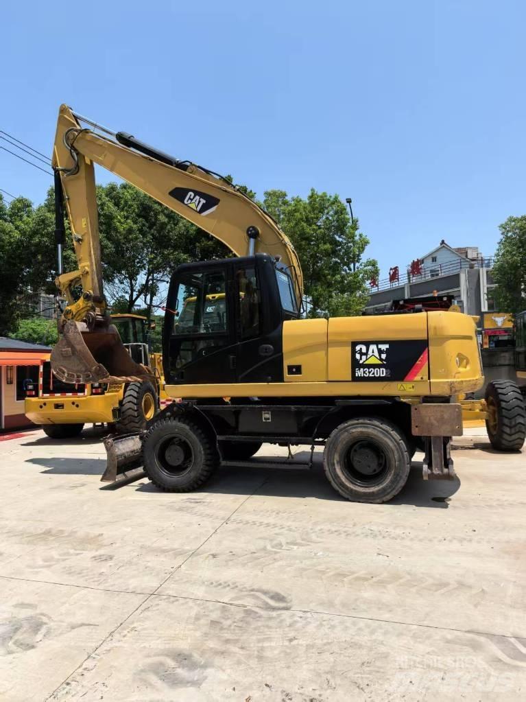 CAT M 320 Koparki kołowe