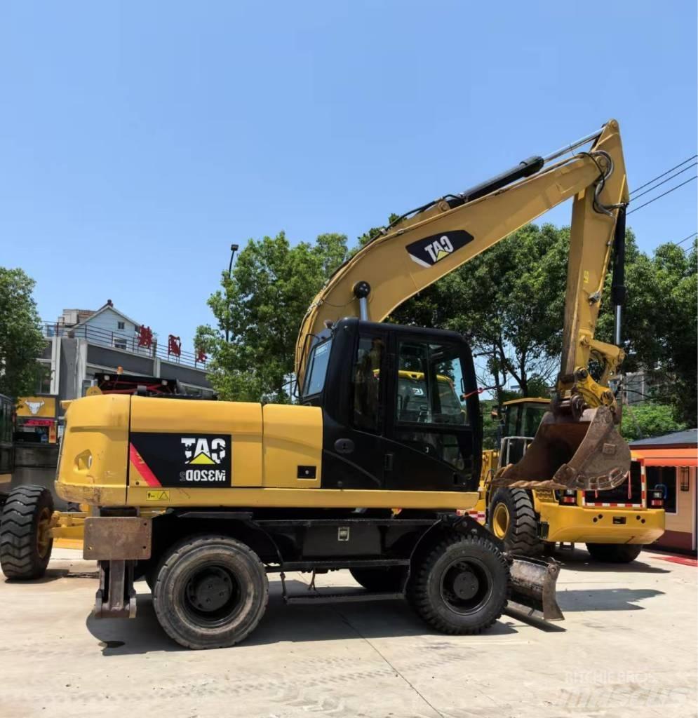 CAT M 320 Koparki kołowe