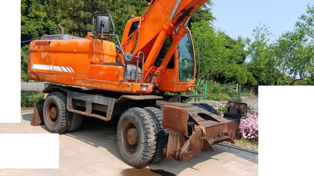 Doosan DX 210 W Koparki kołowe