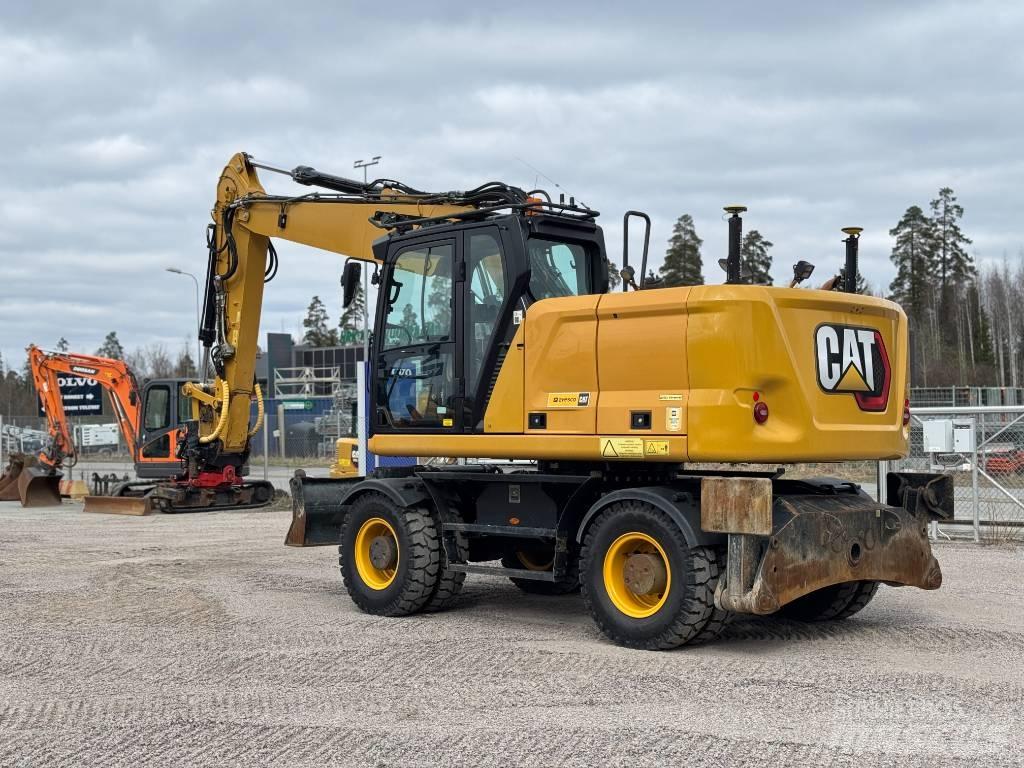 CAT M 318 Koparki kołowe