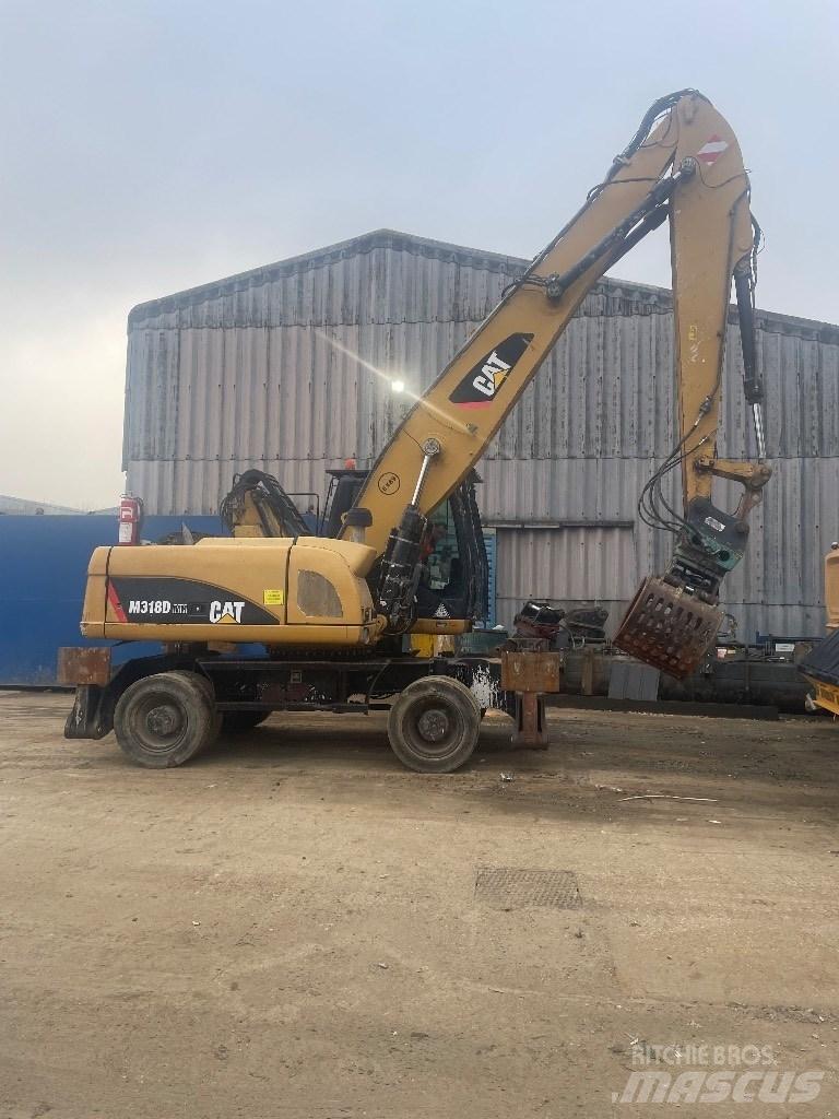 CAT 318 dmh Magazynowanie - Inne