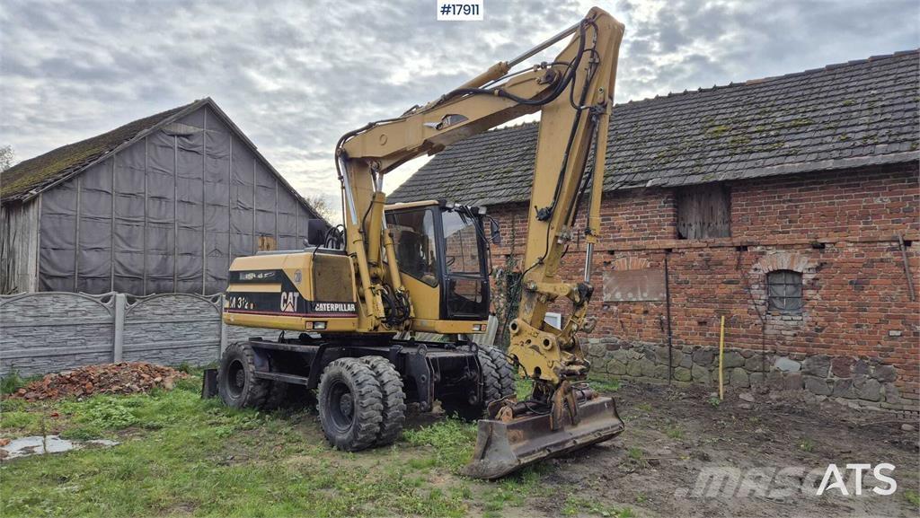 CAT M312 Koparki kołowe