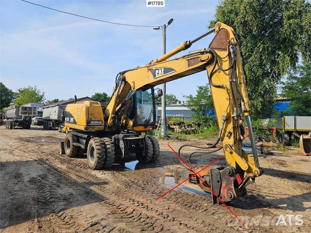CAT M313 C Koparki kołowe