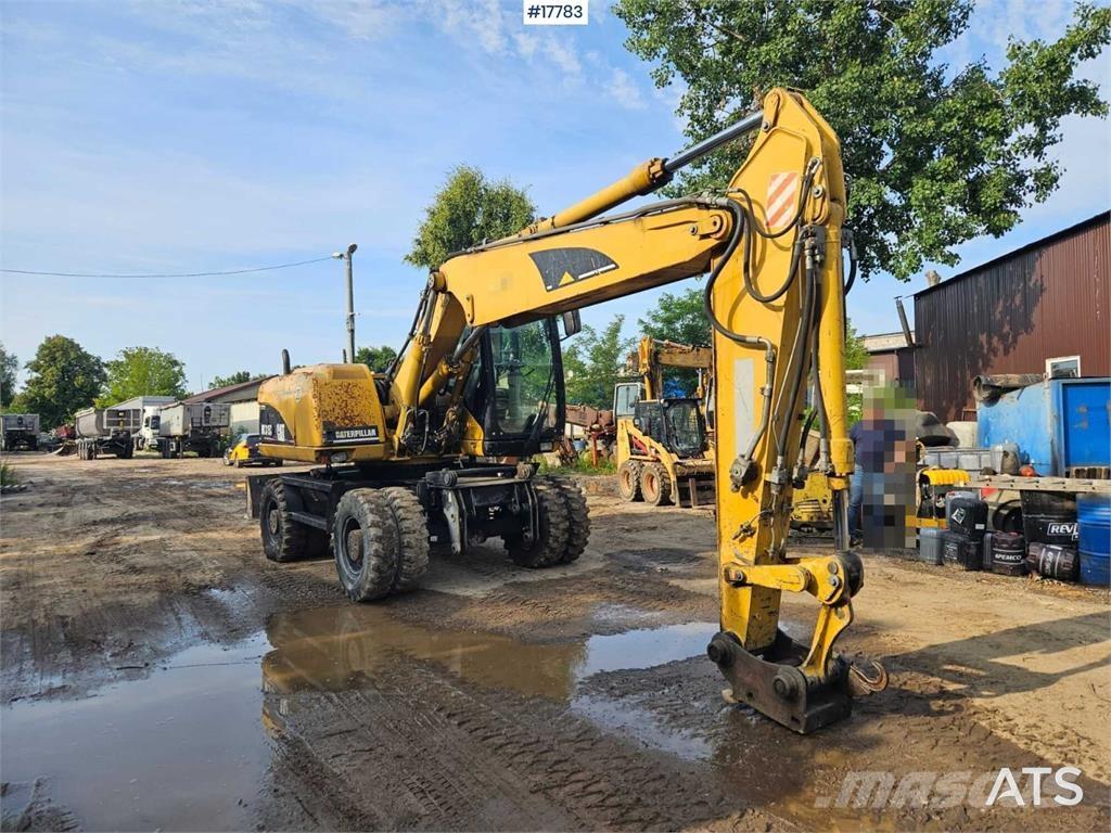 CAT M315C Koparki kołowe