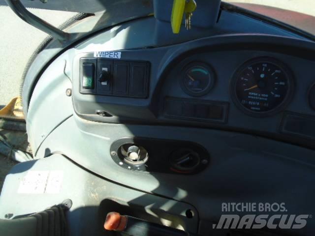 New Holland 575 E Koparko-ładowarki