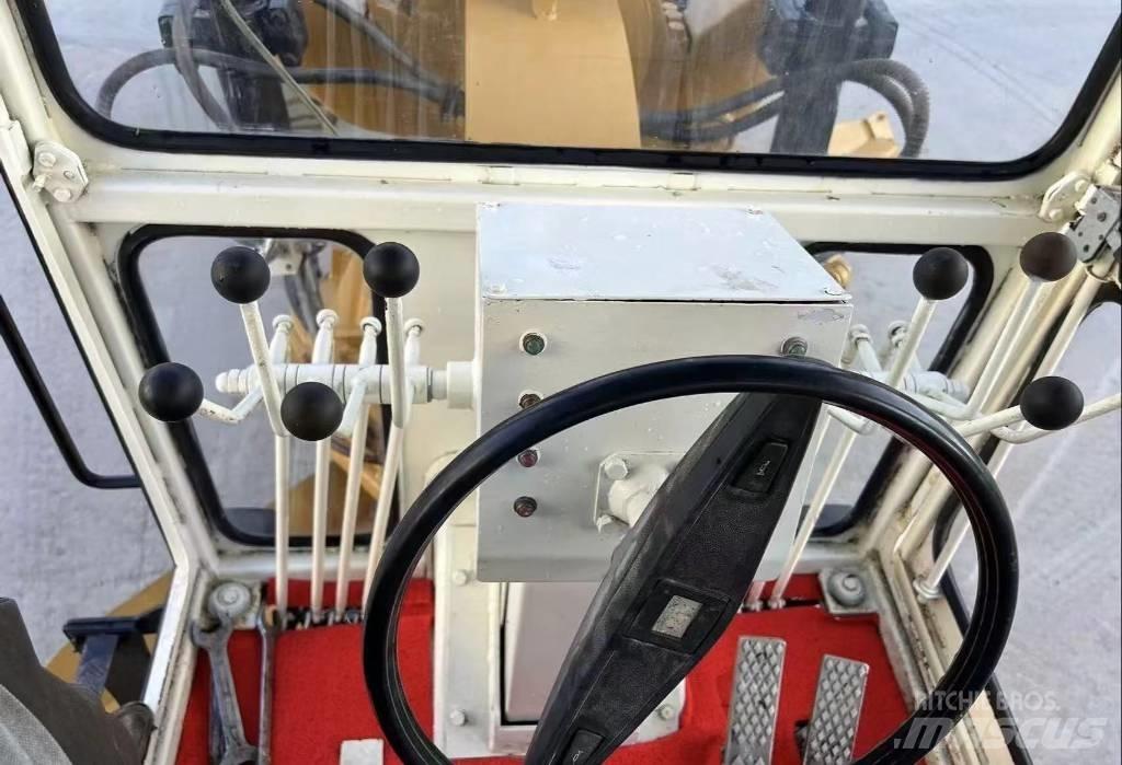 CAT 140 K Równiarki