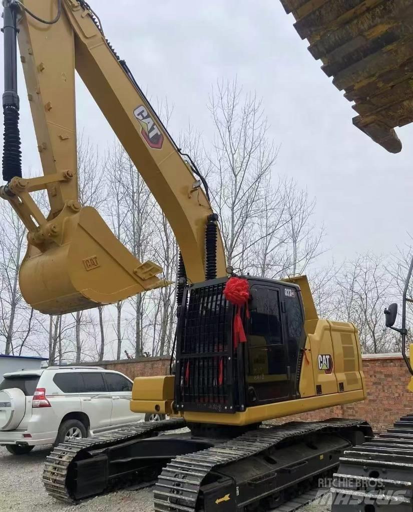 CAT 323 Koparki gąsienicowe