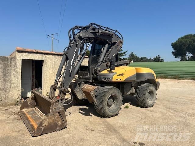 Mecalac 12 MTX Koparki kołowe
