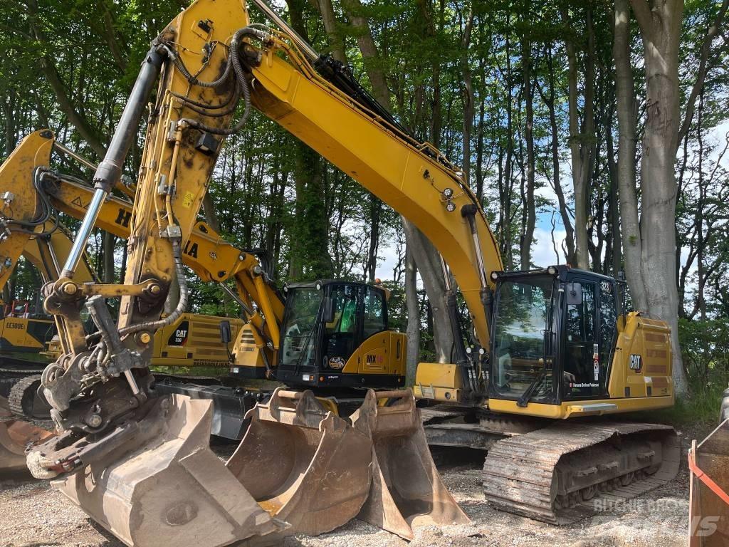 CAT 323 Koparki gąsienicowe