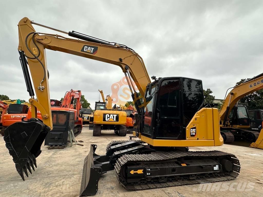CAT 310 Koparki gąsienicowe