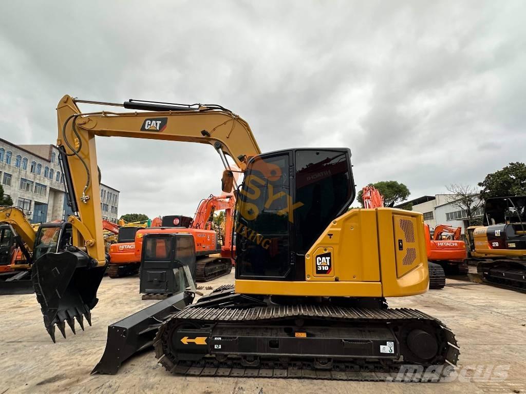 CAT 310 Koparki gąsienicowe