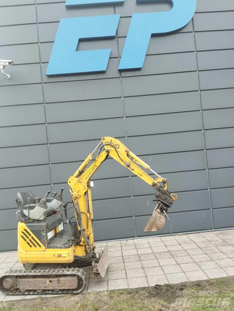 New Holland E 9 SR Minikoparki