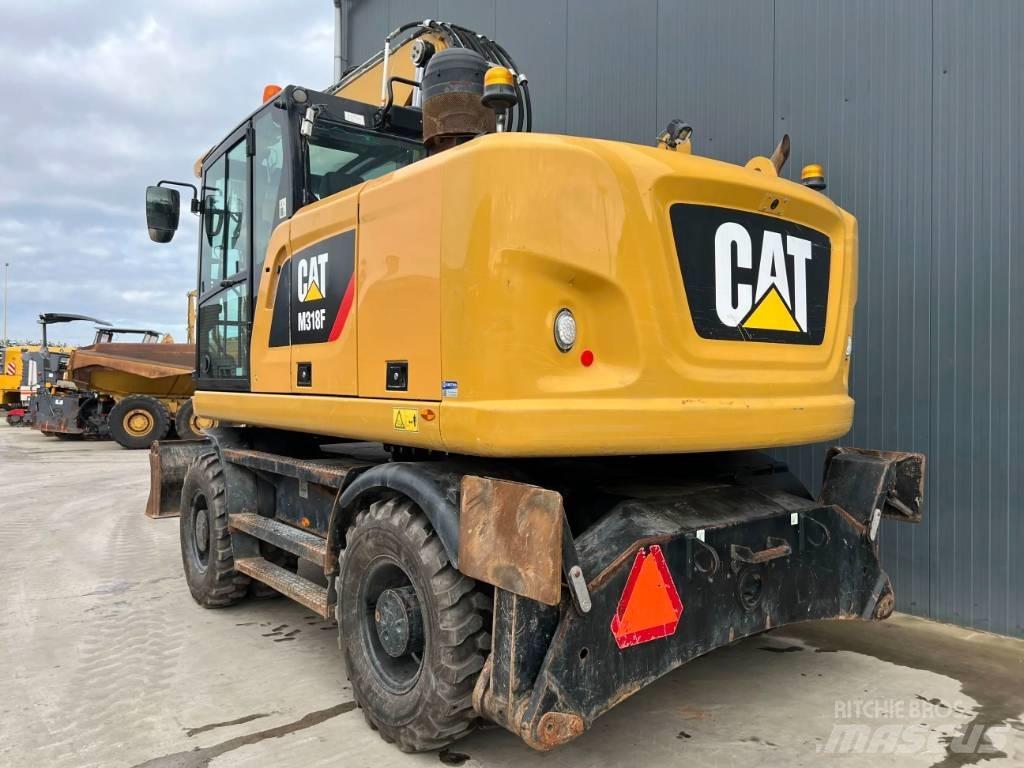 CAT M318F Koparki kołowe