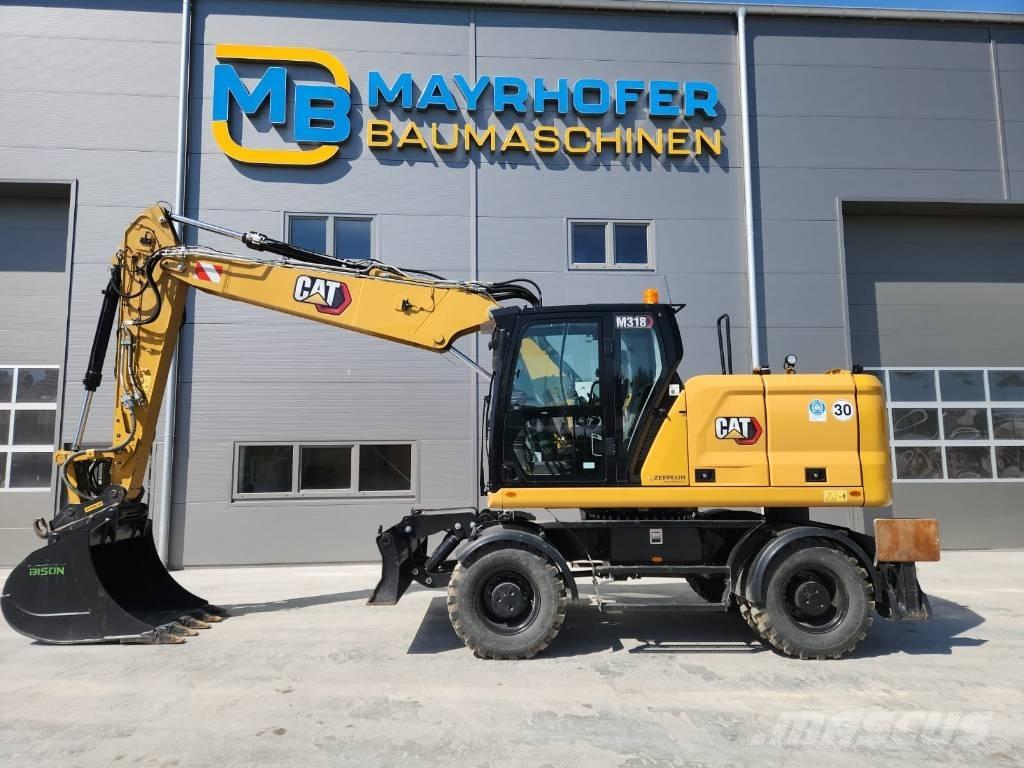 CAT M 318 Koparki kołowe