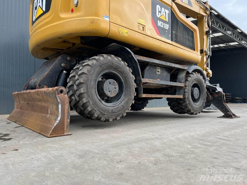 CAT M318F Koparki kołowe