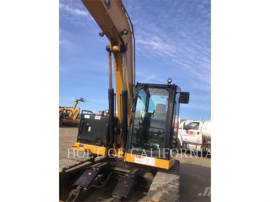 CAT 310 Koparki gąsienicowe